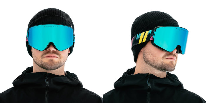 Arctic Motion | Aura Snow Goggles - Matte Black Frame With Black, Purple & Teal Strap & Arctic Blue Easy Swap Magnetic Lens Snow Goggles | $95 US | Blenders Eyewear